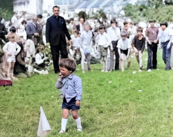 A young spectator toes his own line at the 1972 St. Paul's NS Sports.