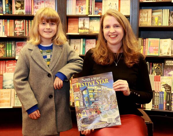 Toby McDonald, who performed at the launch, and Mary Frances Ryan, Editor, Waterford News & Star, at The Book Centre for the launch of the Festive Star. Photo: Joe Evans Toby McDonald, who performed at the launch, and Mary Frances Ryan, Editor, Waterford News & Star, at The Book Centre for the launch of the Festive Star. Photo: Joe Evans