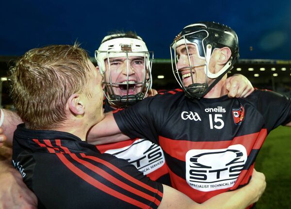 Ballygunner's Dessie Hutchinson celebrates with Pauric Mahony and Philip Mahony after Munster final glory in 2023. 