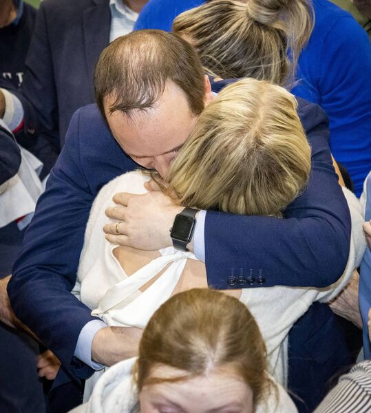 Newly elected TD John Cummins of Fine Gael with a hug for his wife Inga. Photo: Joe Evans