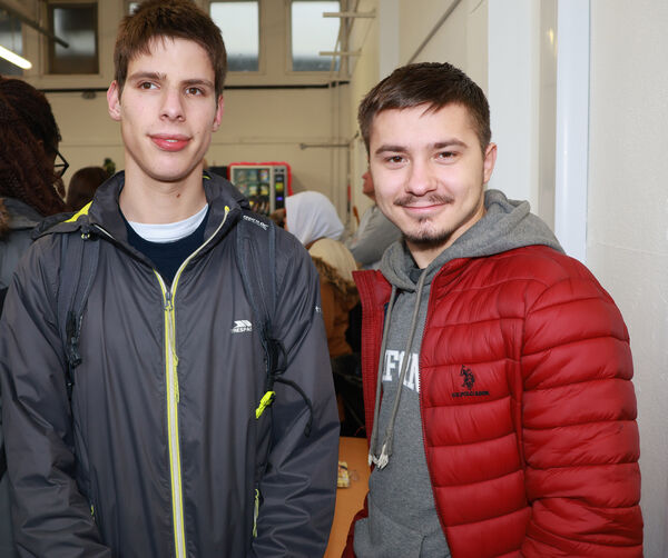  Padraig and Dima, at the WCFE Christmas Fair 2024 beneficiariesare The Women's Centre and Helping Hands, with over €1, 200 raised at the event in WCFE. Photo: Joe Evans