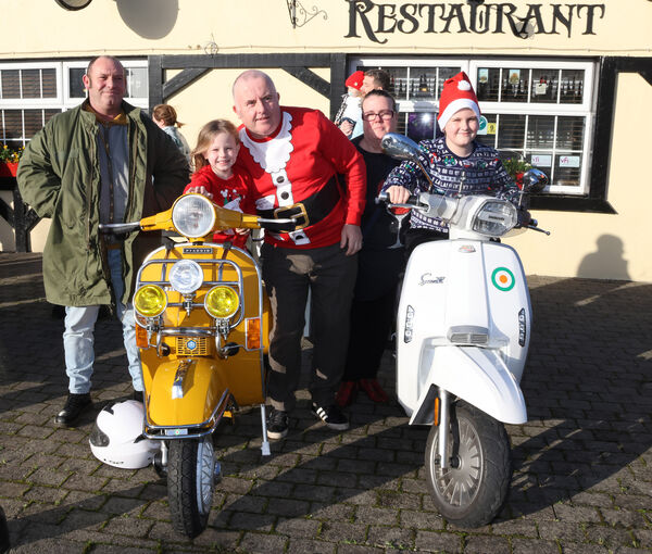  Roy, Megan, Bo, Noleen and Padraig at the annual Only Fools on Scooters UHW Toy Run. 	All Photos: Joe Evans