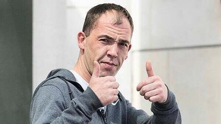 Man accused of harassment put shotgun cartridge in ex's hand saying 'you're next', court hears