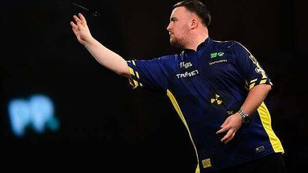 Luke Littler overcomes slow start to progress at World Darts Championship