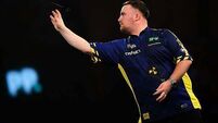 Luke Littler overcomes slow start to progress at World Darts Championship