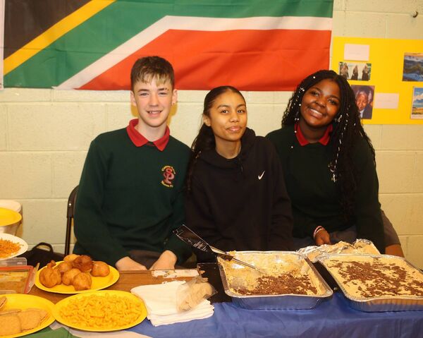 Dylan, Murtinique and Georgia, South Africa, at St. Paul's Community College, Multicultural School Celebration Day. Photo: Joe Evans