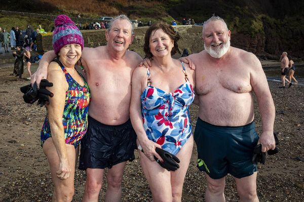  Triona, Michael, Terry and Eddie, at the Ballymacaw Cove, St. Stephens's Day swim in aid of Waterford Helpimg the Homeless. Photo: Joe Evans