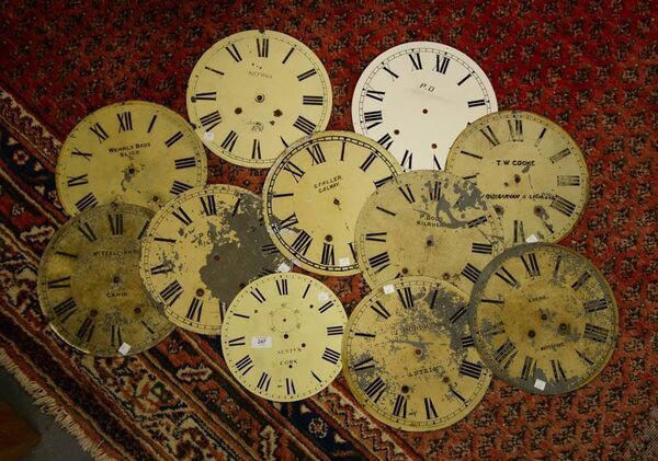Lot 247: Nine vintage clock faces of Irish interest, ideal for a feature wall display. Estimate €50-80.