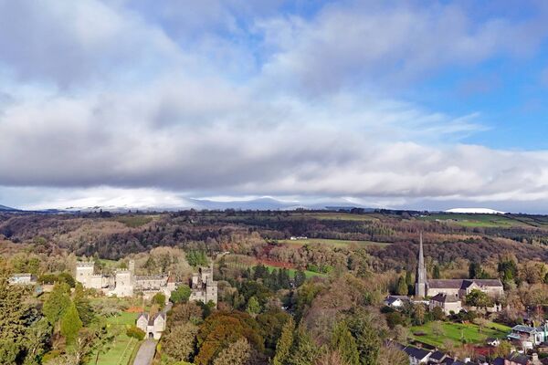 Lismore Castle with snow covered mountains in the background. Pic: Eddie Dee