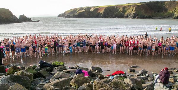 Participants in the Michael Power Christmas Day Memorial Swim 2024, the proceeds of which will go to Boatstrand Sea Safety Centre. Photos: John Power