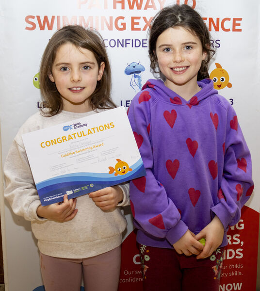  Emily and Lauren, who received their swimming certificates at Kingfisher.
