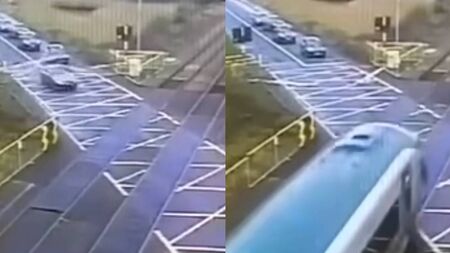 WATCH: Car breaching rail crossing missed train by six seconds