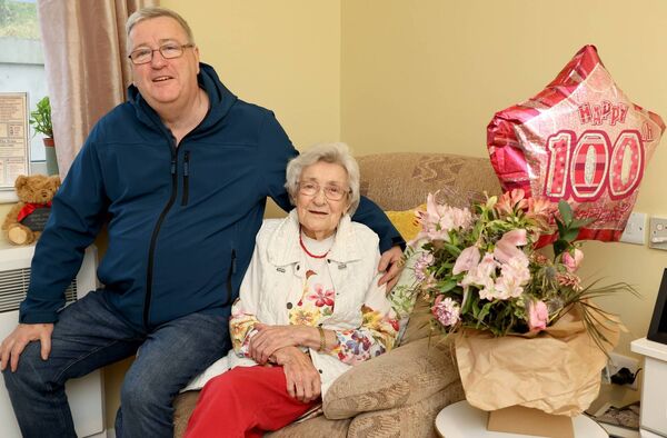 Sadie Duffin, who celebrated her 100th Birthday at the Holy Ghost Residential Home, pictured here with her nephew, Philip Doherty. Photo: Joe Evans