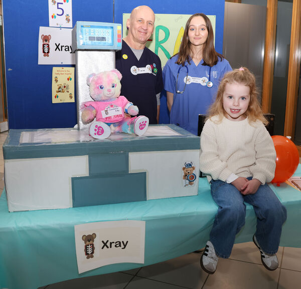 Dr. Mike and Nurse Fia with Georgia at the Juniors for Juniors Teddy Bear Hospital. Dr. Mike and Nurse Fia with Georgia at the Juniors for Juniors Teddy Bear Hospital.