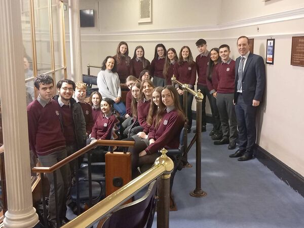The students pictured in Dáil Éireann with Minister John Cummins The students pictured in Dáil Éireann with Minister John Cummins