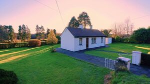 Waterford Property: Bungalow and extensive gardens offers potential for delightful home