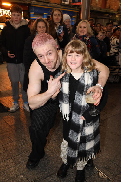 Moncrieff pictured with young fan and fellow musician Toby McDonald at the Apple Market gig. Photo: Joe Evans Moncrieff pictured with young fan and fellow musician Toby McDonald at the Apple Market gig. Photo: Joe Evans