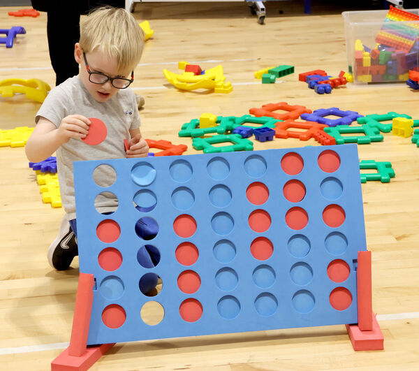  Fun and games at the Glor na Mara Junior Infants open evening.