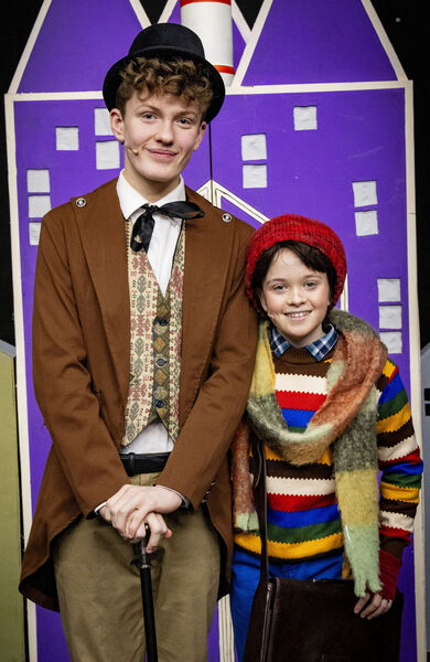  Alex Brophy as Willie Wonka and Faye Quinn as Charlie Bucket.