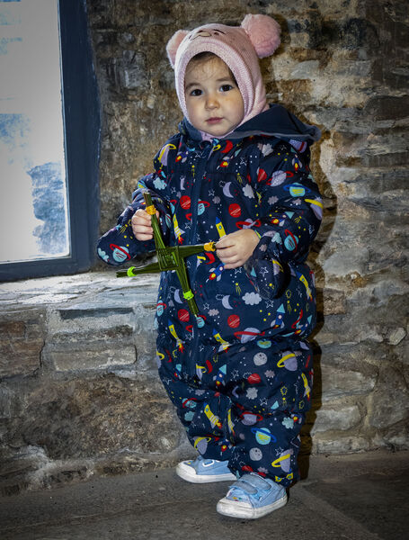  Young Jessie happy with the St. Brigid's Cross made for her at a workshop in Reginald's Tower. Photo: Joe Evans