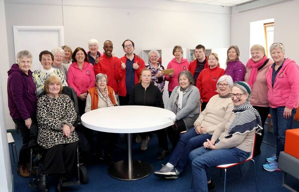 Veronica Davis on behalf of the Tramore Library Knitting Group, presented a cheque for €1,000 to Marie Cullen, who accepted on behalf of the Tramore &amp; Waterford Arch Club. Photo: Joe Evans