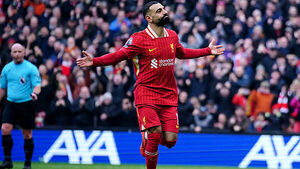 Liverpool survive late scare against Wolves to move seven points clear