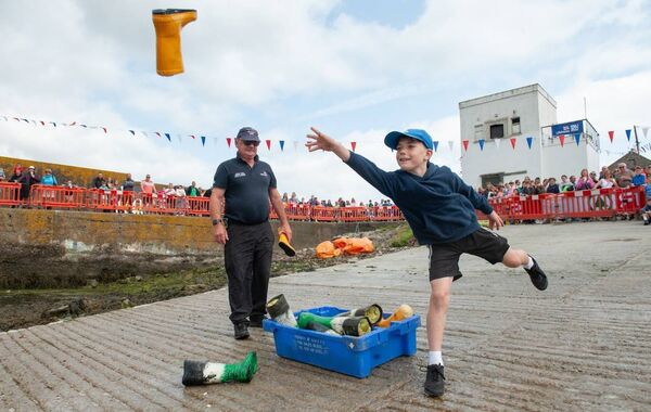 Thomas Ó Droma pictured at the welly throwing contest as part of the Helvic Swim fundraiser in 2024. (Pic: Andrew Miller)
