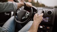 Waterford Garda division sees 1,600 people fined for using phone while driving 