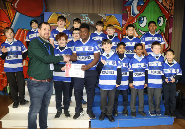  Mr. Frisby presented a certificate to Casey on behalf of the Mount Sion team, at the Primary Teachers Promoting Chess, competition at Mount Sion Primary School Hall. Photo: Joe Evans