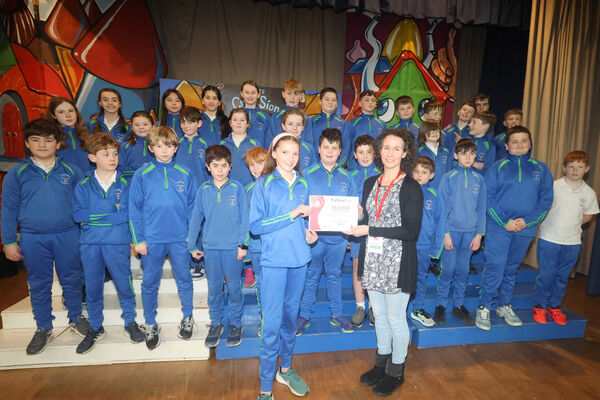  Oniosa presented a certificate to Aoife on behalf of the Gaelscoil Phort Lairge team, at the Primary Teachers Promoting Chess, competition at Mount Sion Primary School Hall. Photo: Joe Evans