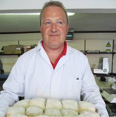 Brian Hickey with a batch of freshly baked blaas.