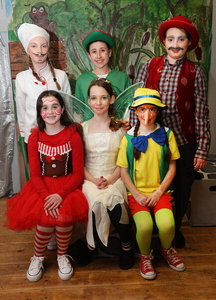  Millie as the Baker, Meábh as Peter Pan, Aliyah as Gepetto, Ava as Ginger Bread Girl, Eva as Tinkerbell and Aine as Pinocchio, in Ballyduff Youth Drama's production of Shrek Saves Far Far Away. 	All Photos: Joe Evans
