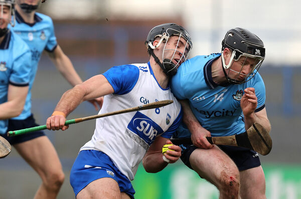 Waterford's Mark Fitzgerald is tackled by Cian O'Sullivan of Dublin