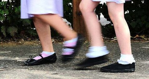Girl (11) dies after being hit by car as she got off school bus
