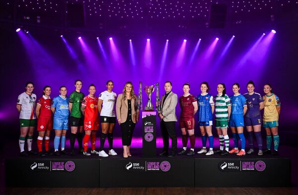 Ashley Morrow, head of brand, advertising and sponsorship at SSE Airtricity; and League of Ireland director Mark Scanlon with SSE Airtricity Women's Premier Division players, from left, Ciara McNamara of Cork City, Eimear Lafferty of Sligo Rovers, Keelin Dodd of DLR Waves, Karen Duggan of Peamount United, Pearl Slattery of Shelbourne, Izzy Groves of Athlone Town, Lynsey McKey of Galway United, Jillian O'Toole of Treaty United, Aine O'Gorman of Shamrock Rovers, Danielle Griffin of Waterford, Ciara Rossiter of Wexford and Rachel Kelly of Bohemians during the SSE Airtricity Women's Premier Division Launch 2025 at Mansion House in Dublin. 