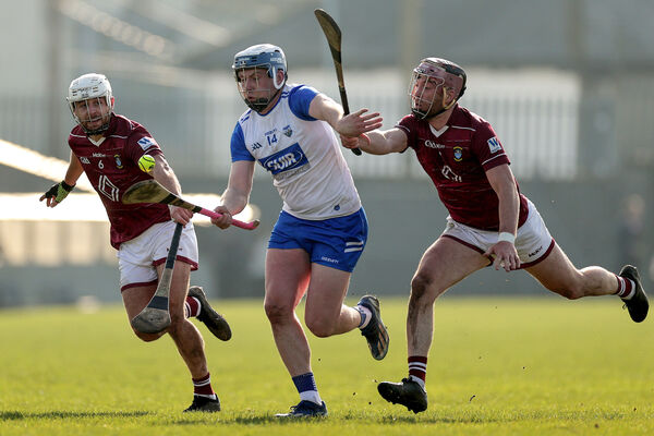 Waterford's Stephen Bennett with Robbie Greville and Johnny Birmingham of Westmeath
