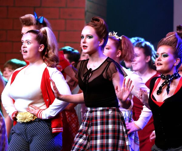 A scene from De La Salle College's production of Little Shop of Horrors. Photo: Joe Evans A scene from De La Salle College's production of Little Shop of Horrors. Photo: Joe Evans