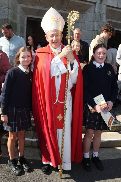 Lily Power and Lia Power, Our Lady of Mercy, who were confirmed by Bishop Alphonsus Cullinan at the Holy Family Church. Photo: Joe Evans