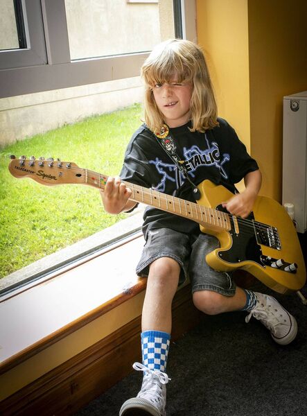 Toby, learning guitar at Klub Muzik's Rock Camp. Photo: Joe Evans Toby, learning guitar at Klub Muzik's Rock Camp. Photo: Joe Evans