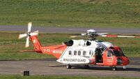 Helicopter and mountain rescue attend to injured walker on ridge above Waterford's Coumshingaun