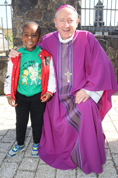 Michael with Bishop Alphonsus Cullinan. Michael with Bishop Alphonsus Cullinan.