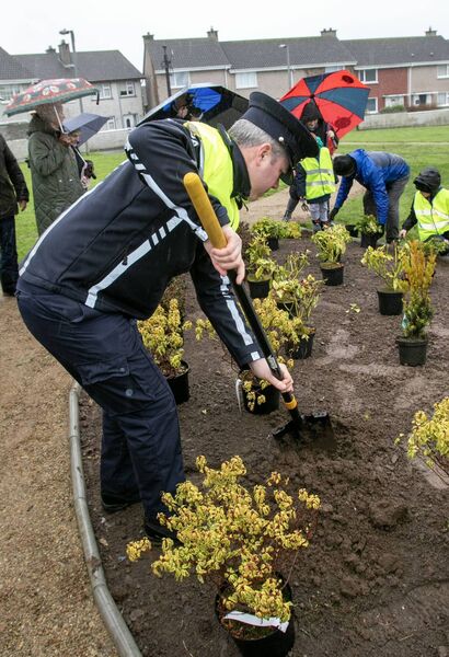 Community Garda David Browne gets stuck into the work at St. Paul's Jubilee Community Memorial Garden at Central Avenue, Lisduggan. Photo: Joe Evans