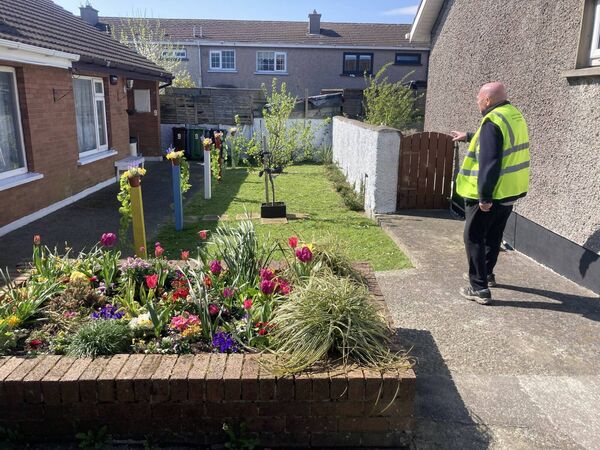 Cllr John Hearne showing the beautiful work, which has been done at Francis Court.