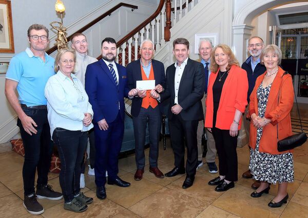 West Waterford AC's Joe Gough was announced as the March winner of the Waterford Sports Awards in association with WLR and the Granville Hotel and he is pictured receiving his award from Philip Erskine, Granville Hotel and Neil Gough, WLR, also included were judges, Catherine Power, Jordan Norris and Brid Golden, Eilis Gough, Paul Savage, Paschal Halley and Fintan Walsh.