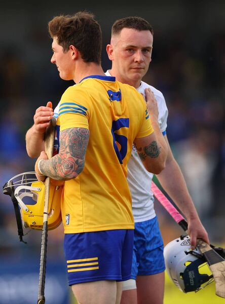 Waterford's Stephen Bennett and Clare's Jack Browne after their Munster Senior Hurling Championship clash in 2023. Photos: INPHO