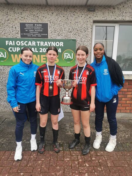 Zoey Croke of Waterford FC, Kayleigh O Neill, Sophie Whittle joint-captains) and Stephanie Dumevi of Waterford FC.