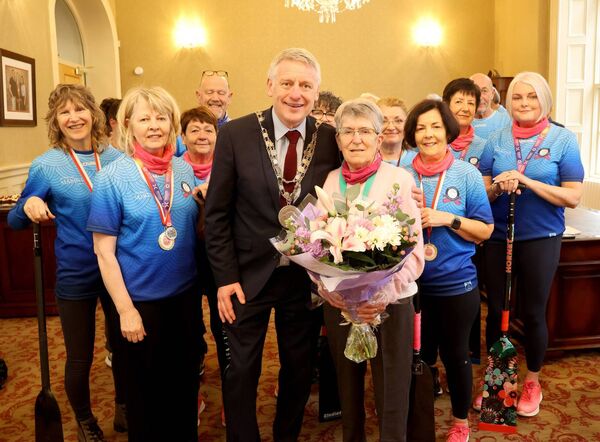 Mayor of Waterford City &amp; County Cllr Jason Murphy, made a special presentation on behalf of The waterford Dragon Boat Club to Nonie Grant, who retired from the club after 15 years service. Photo: Joe Evans