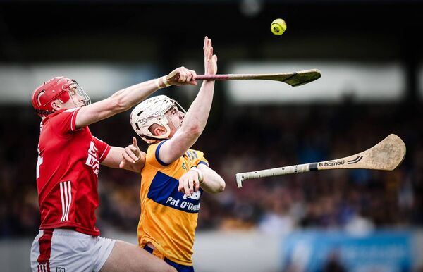 Clare's Adam Hogan and Cork's Alan Connolly go for this sliothar in last Sunday's pulsating Munster Senior hurling championship opener that ended in a draw. Photo: INPHO/Tom Maher