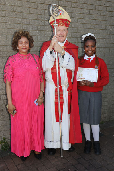 Imani Kihuri, St. Ursula's, who was confirmed by Bishop Alphonsus Cullinan at the Sacred Heart Church. Imani Kihuri, St. Ursula's, who was confirmed by Bishop Alphonsus Cullinan at the Sacred Heart Church.