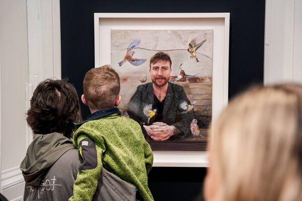 Visitors to WGOA view Pat O'Brien's painting of Conor Cleare, Image by DGM Photographic